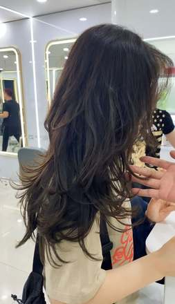 Kiểu tóc Xoăn bung