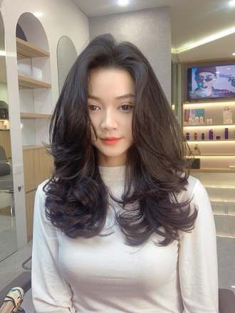 Kiểu tóc Xoăn bung